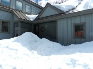 The front door is still blocked by snow on the last day of March, 2015.