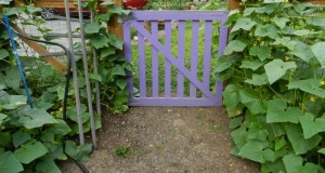 The vines are threatening to knit the gate shut.